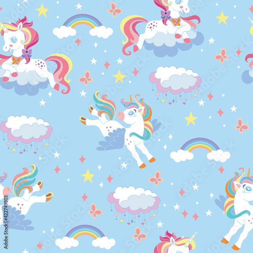 Seamless vector pattern with kawaii unicorns blue