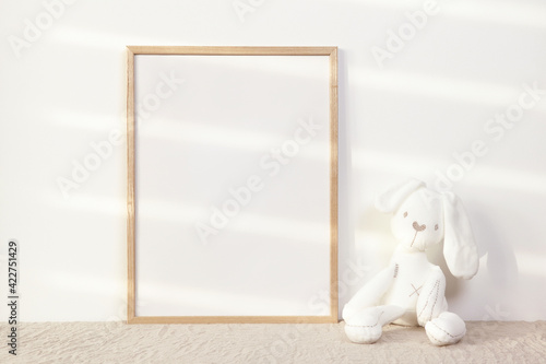 Nursery photo frame mockup with white bunny