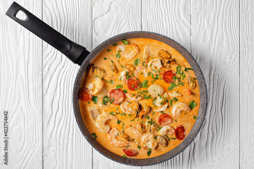 seafood saute in a pan, top view