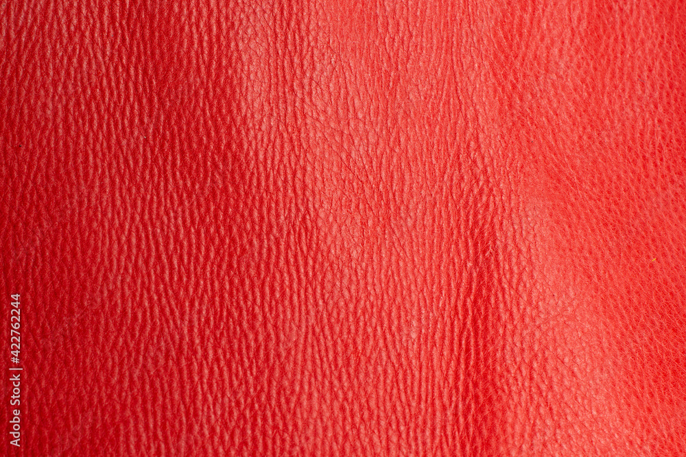 Fototapeta premium Red textured leather for design template and background.Shoe industry