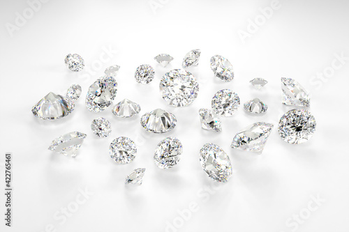 Photography A scattering of diamonds of different sizes on a white background