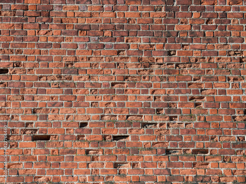 Naklejka premium Red grunge brick wall, abstract background texture with old dirty and vintage style pattern
