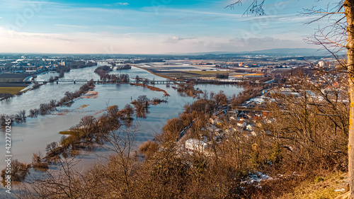 Beautiful far view of a flooded winter landscape at the famous Bogenberg, Danube, Bavaria, Germany © Martin Erdniss