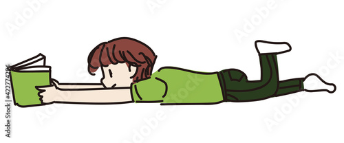 寝転がって本を読む少年のイラスト