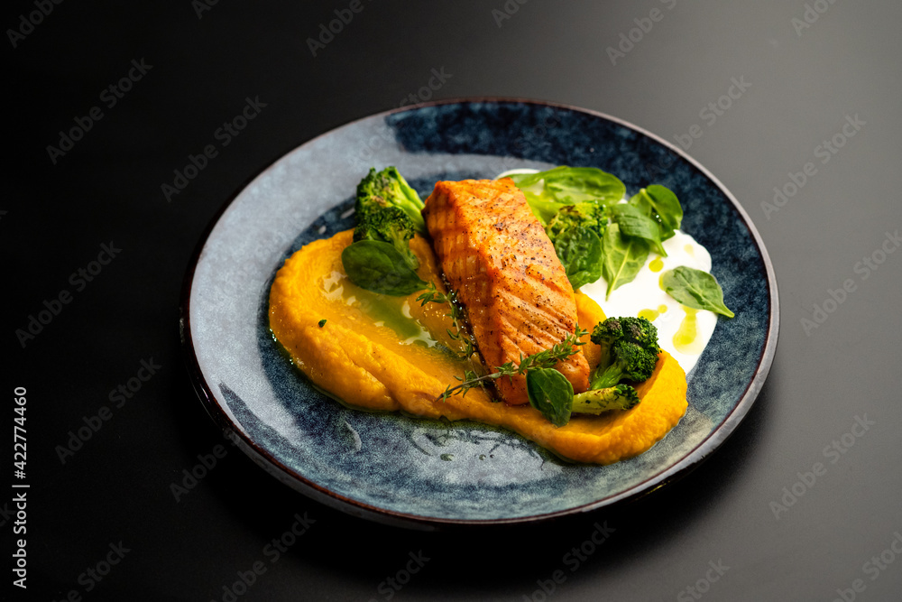 Grilled red fish fillets. Salmon with vegetable puree and spinach. Grilled red fish fillets. Salmon with vegetable puree and spinach.