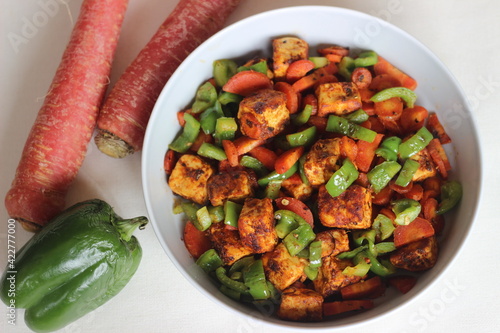 Canvas Print Tawa roasted paneer with sauteed carrots and capsicum.