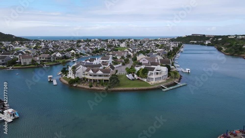 Aerial view of canal with beautiful houses around it photo