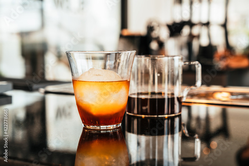 cold drip coffee in glass with ice ball