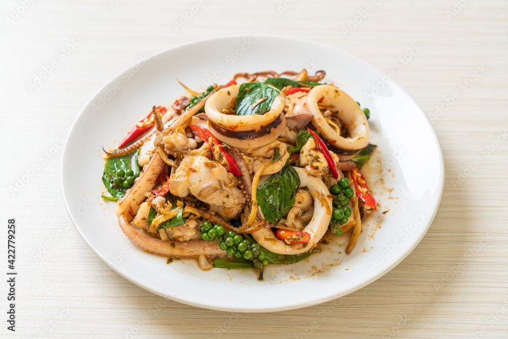 stir fried holy basil with octopus or squid and herb stir fried holy basil with octopus or squid and herb