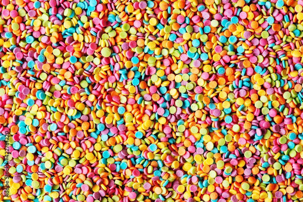 Texture of multicolor confectionery sprinkles Texture of multicolor confectionery sprinkles