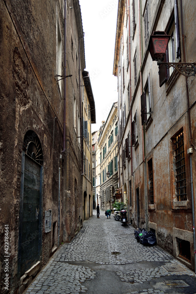 narrow street in old city (downtown) - Rome, Italy
