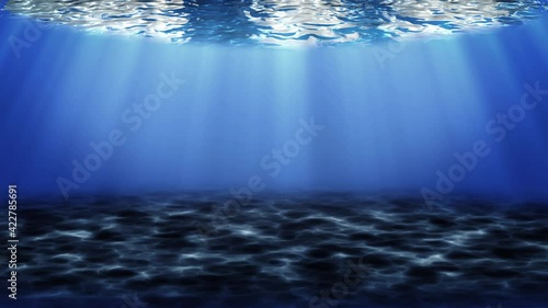 Underwater light creates a beautiful veil, consisting of sunlight. Underwater ocean waves oscillate and flow with the rays of light