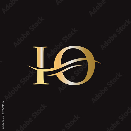 Initial IO letter linked logo vector template. Swoosh letter IO logo design. IO Logo design vector
