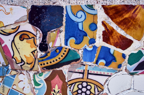 Broken tiles mosaic at park Guell, Barcelona © Olha Dokalenko