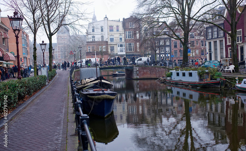  Along the canal walk citizens and moving vehicles