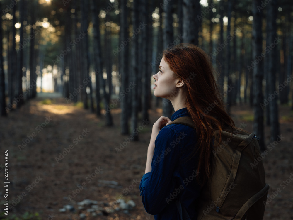Happy woman tourist with backpack vacation nature fresh air and forest