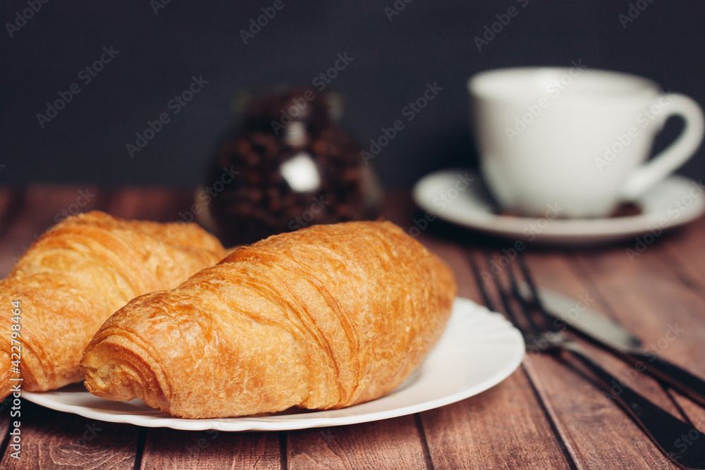 croissants white plates on the table kitchenware a cup of coffee meal dessert croissants white plates on the table kitchenware a cup of coffee meal dessert