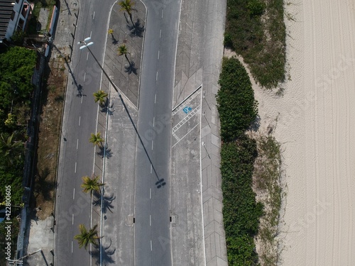 Aerial view of the beach and street in Piratininga in Niterói, Rio de Janeiro. Sunny day. Drone photo