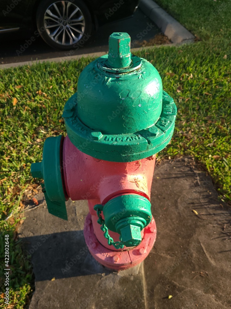 red fire hydrant up close, during morning