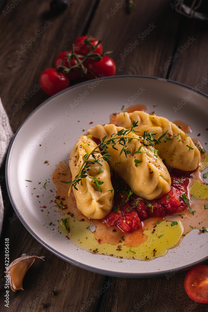 Traditional italian food culurgiones homemade pasta with potato on a plate