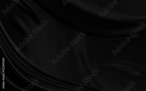 Black gray satin dark fabric texture luxurious shiny that is abstract silk cloth background with patterns soft waves blur beautiful.