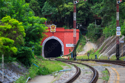 Train station with Tunnel cave and railroad tracks at KhunTan railway station in Lamphun province, Unseen Thailand.