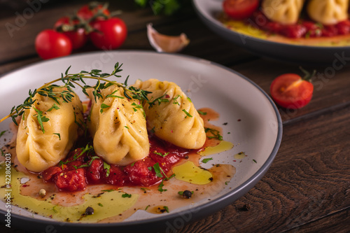 Traditional italian food culurgiones homemade pasta with potato on a plate