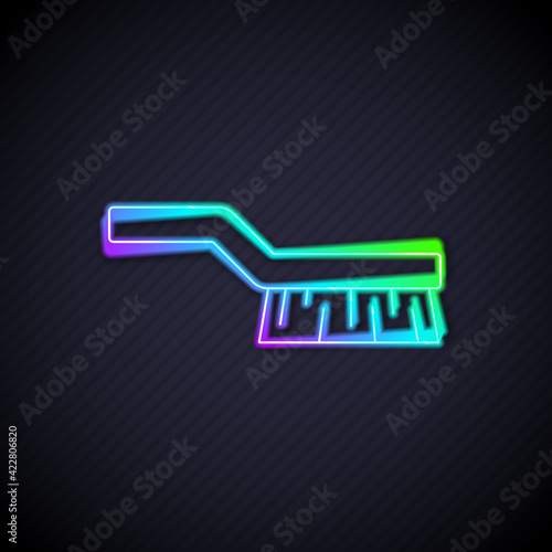 Fotografie Glowing neon line Pool table brush icon isolated on black background