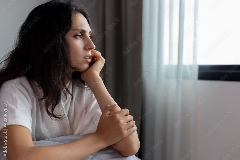 Unhappy woman thinking of bad life that get broken family Female look through window Distraught girl get distressed and stressed Young lady get tired of life It bad day of her life She stay alone Unhappy woman thinking of bad life that get broken family Female look through window Distraught girl get distressed and stressed Young lady get tired of life It bad day of her life She stay alone