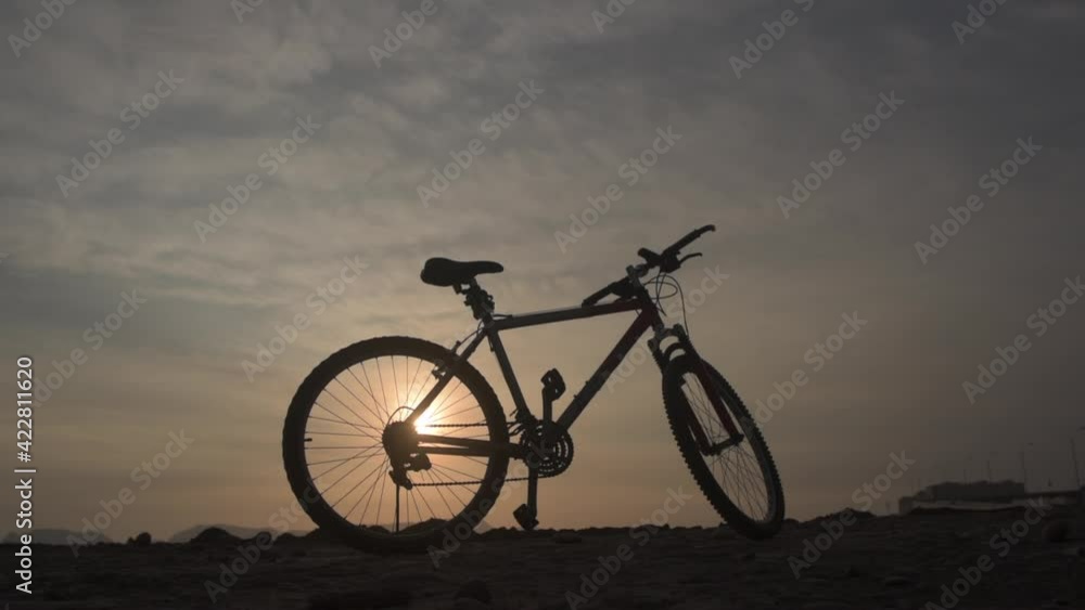 Stock video of a stopped mtb mountain bike silhouette at sunset. Copy space. Stock video of a stopped mtb mountain bike silhouette at sunset. Copy space.