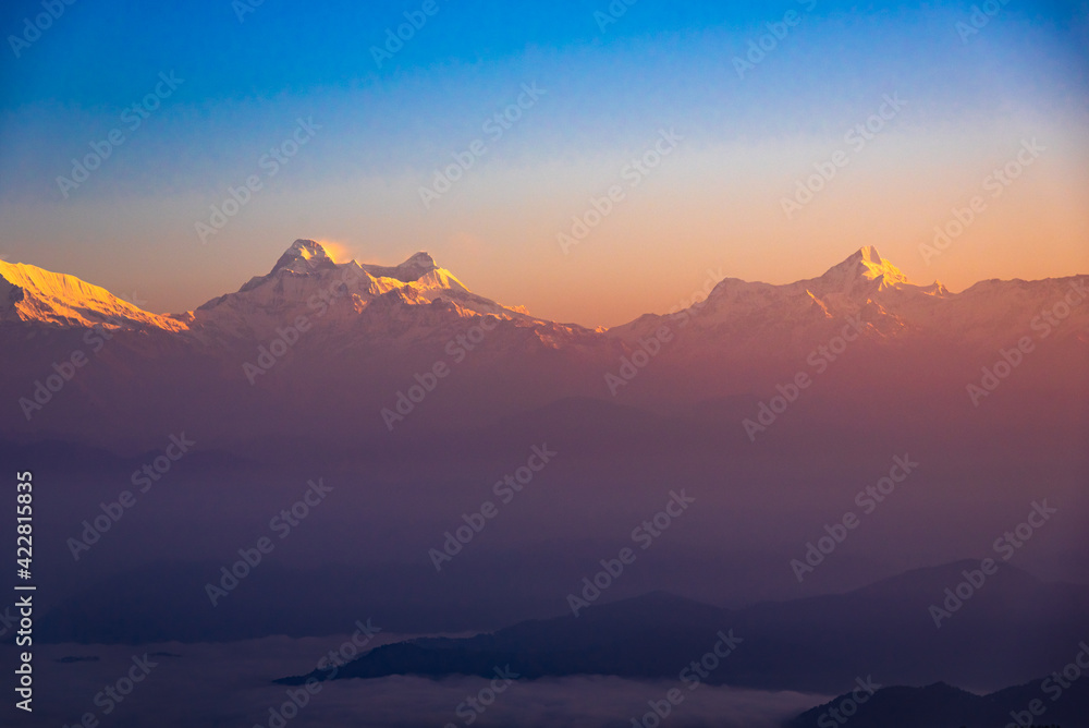 View of Himalays during sunrise at Binsar, a hill station in Almora district, Uttarakhand, India. View of Himalays during sunrise at Binsar, a hill station in Almora district, Uttarakhand, India.