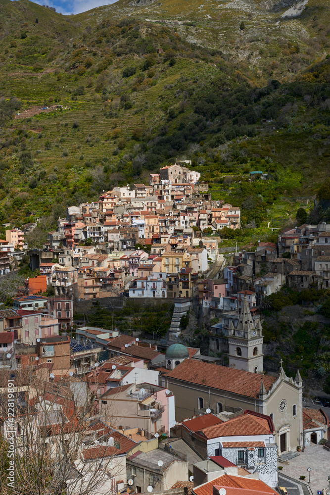 small town in eastern Sicily located between the Peloritani mountains on the east coast, between green valleys and the Ionian sea of the Strait of Messina