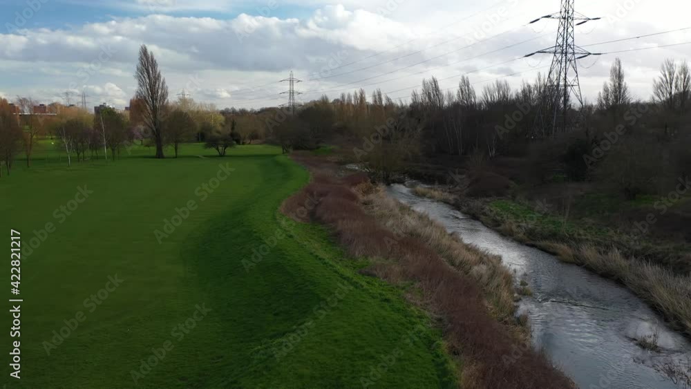amazing shot of a beautiful green field with flowing river in a sunny day, blue sky aerial amazing shot of a beautiful green field with flowing river in a sunny day, blue sky aerial