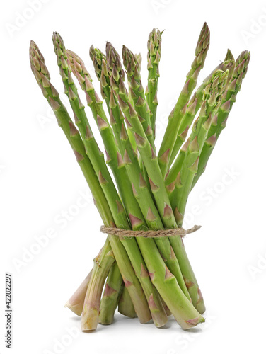 fresh asparagus wrapped with jute rope isolated on white background