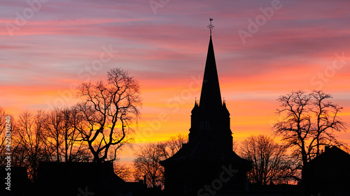 sunset over the church © JWB Fotografie