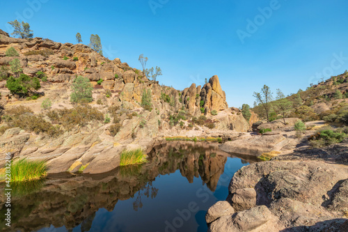 Lake Bear Gulch and rock formations in Pinnacles National Park in California, the ruined remains of an extinct volcano on the San Andreas Fault. Beautiful landscapes