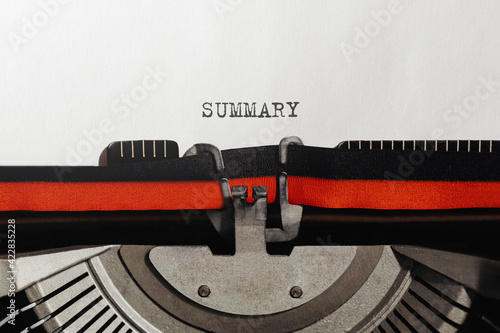 Text Summary typed on retro typewriter