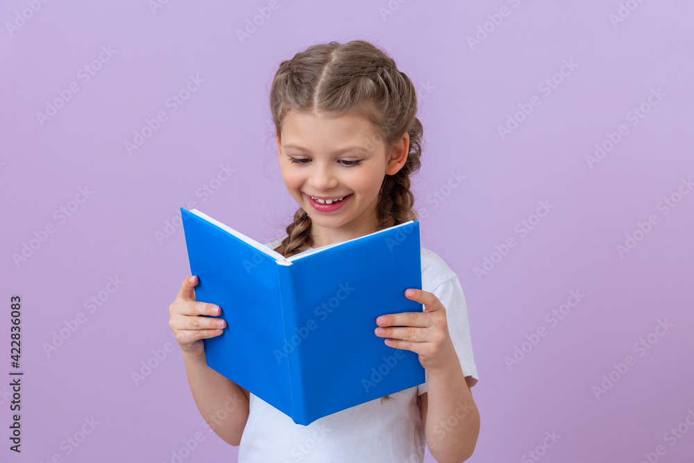 The girl really likes to read an interesting book. The girl really likes to read an interesting book.