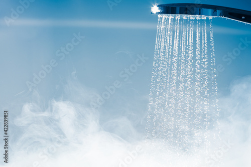 shower with flowing water and steam photo