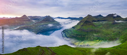 Panorama over majestic sunny fjords of Funningur, Eysturoy island, Faroe Islands. Landscape photography