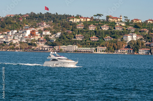 Vászonkép White boat sailing on the Bosphorus, Istanbul.