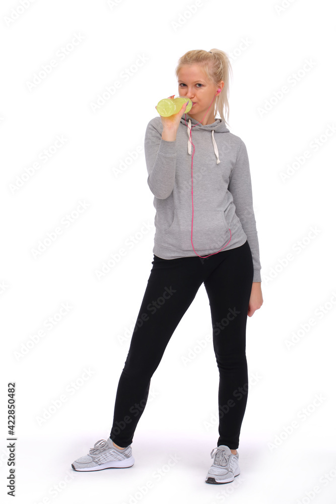 During intense exercise, the girl spends time drinking an energy drink During intense exercise, the girl spends time drinking an energy drink