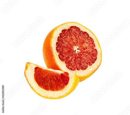 Grapefruit half and slice isolated on white background.