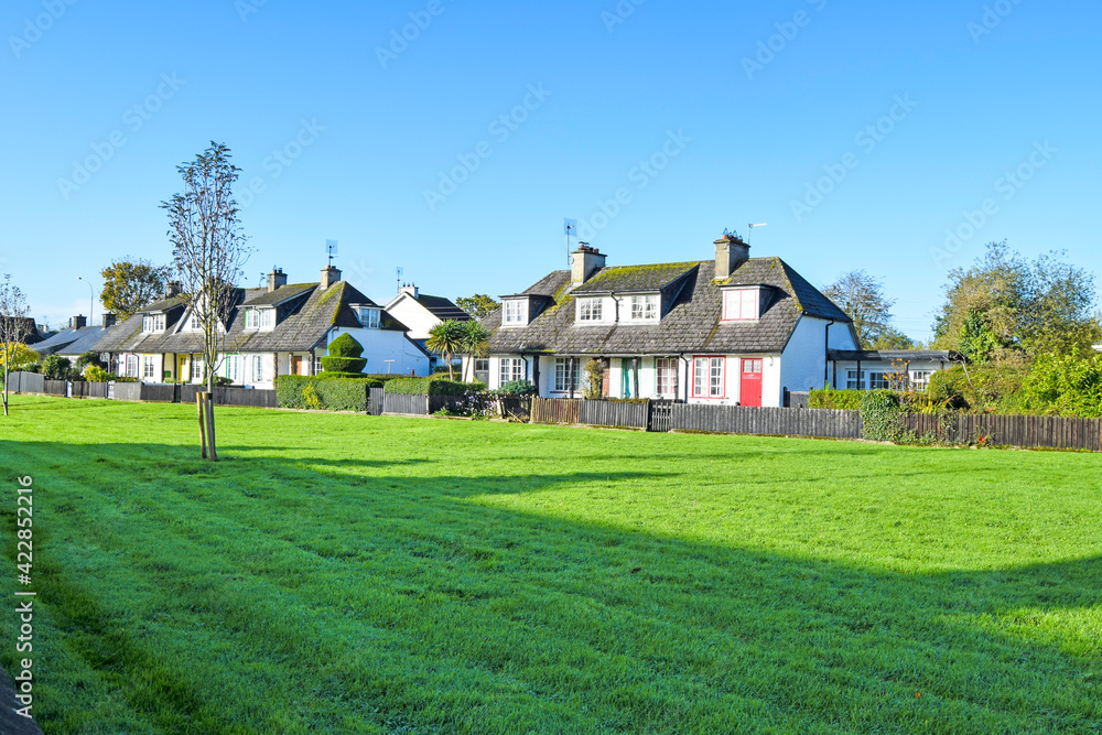 Typical and traditional houses made of adobe in Adare, Ireland Typical and traditional houses made of adobe in Adare, Ireland