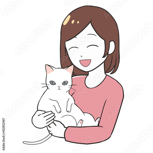 白猫を抱っこする 笑顔の女性
