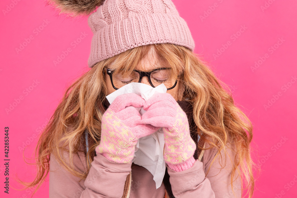 woman with allergy or flu with handkerchief isolated on background woman with allergy or flu with handkerchief isolated on background