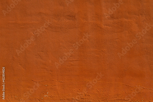 Terracotta color plastered wall