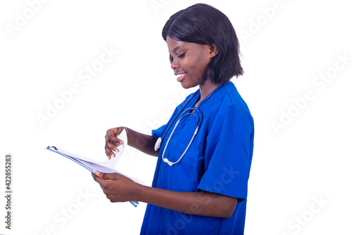 portrait of a young charming nurse with stethoscope, smiling photo