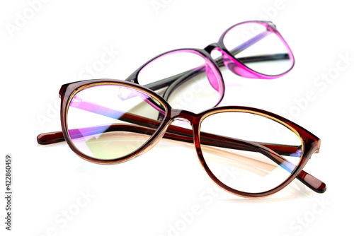 Glasses for vision, in a plastic frame, with transparent optics, two pieces, on a white background