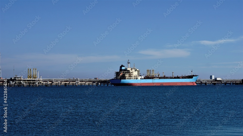oil tanker unloading at port